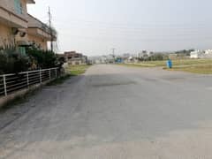 E-18 HECHS Islamabad Residential Plot Surrounded by houses