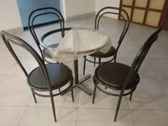 10 Chairs and 6 Round Tables