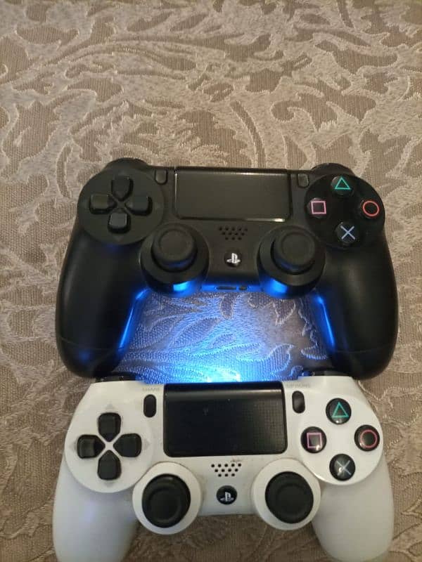 PS5 PS4 controllers x box one controller PS3 controller s and cds 11
