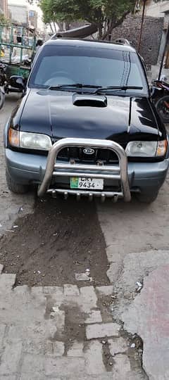 KIA Sportage 2004  my phone num 03039642162