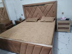 king size bed with side tables and dressing table