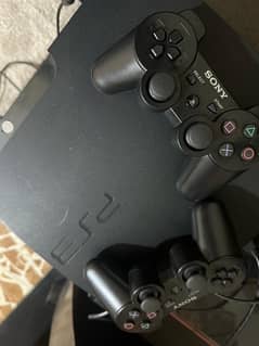 Playstation PS3 With 2 controllers new Games installed