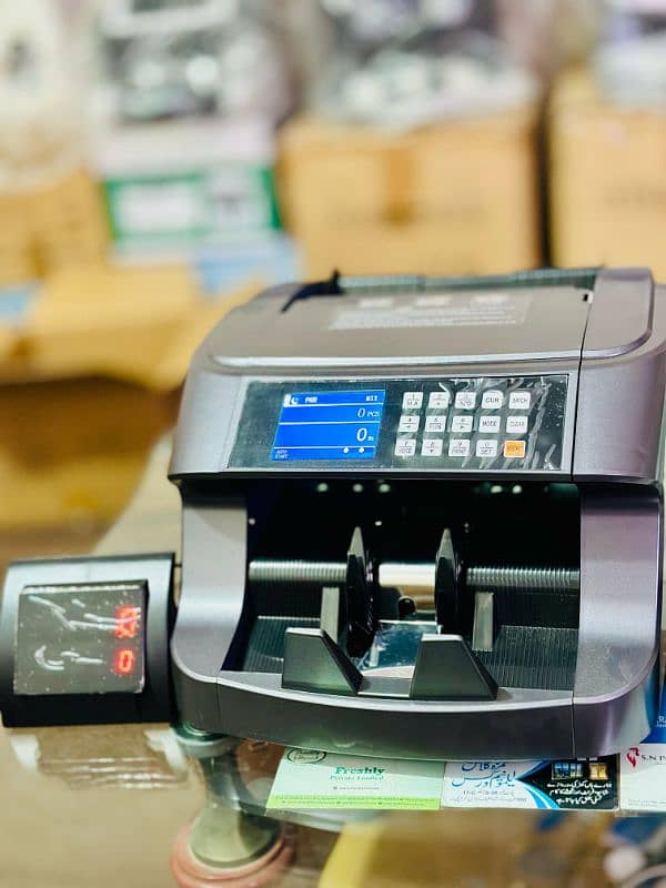 Pakistan . 1 Cash counting,currency bill sorting machine,fake detectio 18