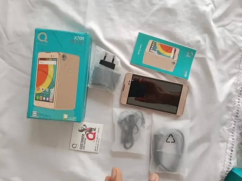 Q Mobile 700 Pro II 3
