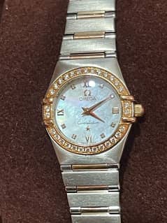 omega constellation ladies gold and diamonds