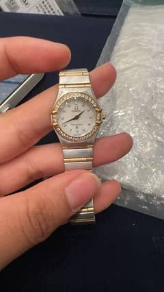 omega full bar gold and diamonds