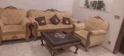 A good condition sofa set with table