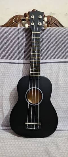 ukulele guitar brand new ( delivery all over the Pakistan )