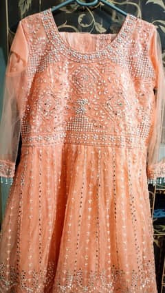 Net clothing with mirror work  in peach color