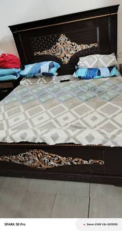 Wooden bed set with dressing table and site tables