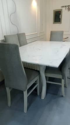 Dining table with Marble top