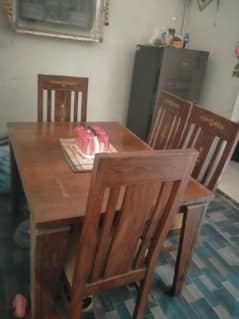 dining table with four chairs