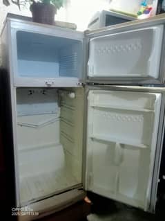 half white refrigerator used full