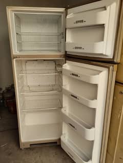 14 cubic feet fridge 2 doors. working fine. plugin and use condition.