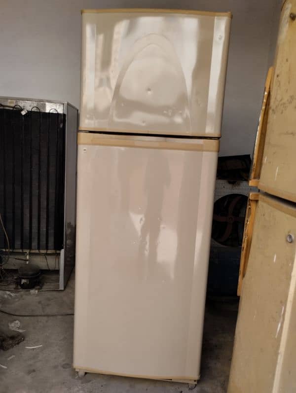 14 cubic feet fridge 2 doors. working fine. plugin and use condition. 2