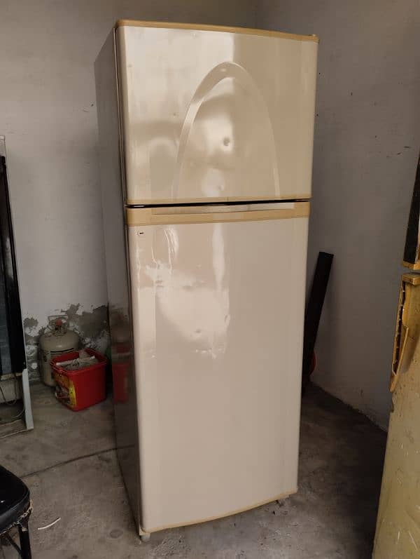 14 cubic feet fridge 2 doors. working fine. plugin and use condition. 3