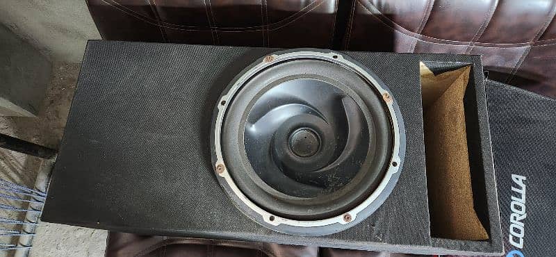 Almani brand sub woofer and amplifier very good result hard bass . 0