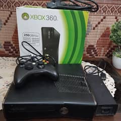 Xbox 360 gaming console with one wired controller