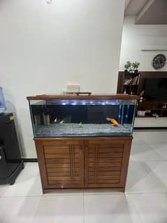 fish aquarium with original wooden table