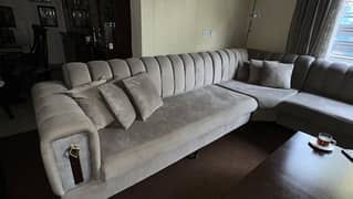 L shaped sofa for sale almost new