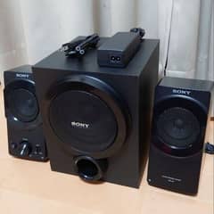 Sony 2.1 Speakers System 2 Speakers and 1 Woofer with Sony Adapter.