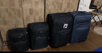 4 travelling bags for sale