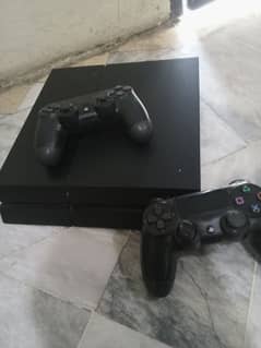 selling an ps4 fat with two controllers