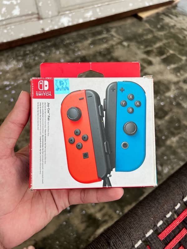 Nintendo Switch Original Joy-Con Controllers (Red & Blue) – For Sale 0