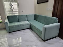 Sea green coloured L Shaped Sofa set