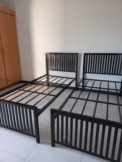 URGENTLY SELLING 2 IRON BEDS