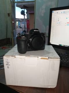 z6 camera charg 1betry 128lexar card viltrox 40mm lenz