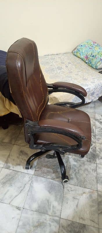 a revolving chair  in good condtion . reliable,soft with a high back. 1