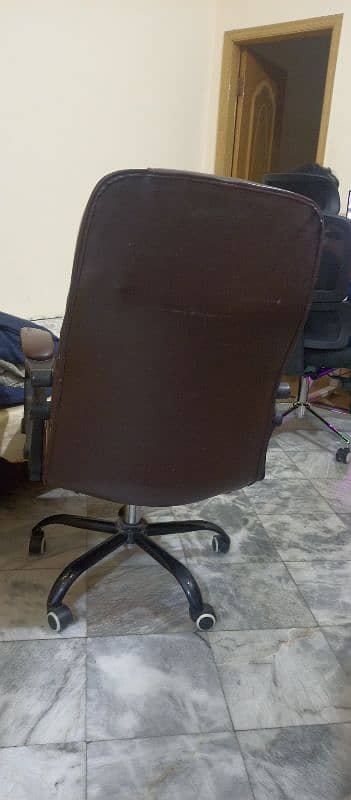 a revolving chair  in good condtion . reliable,soft with a high back. 2