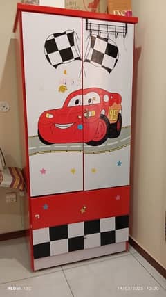 kids wardrobe with rug