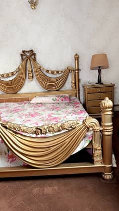 bed with sidetables and dressing