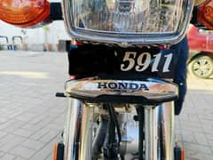 Honda 125 With Special Number 5911