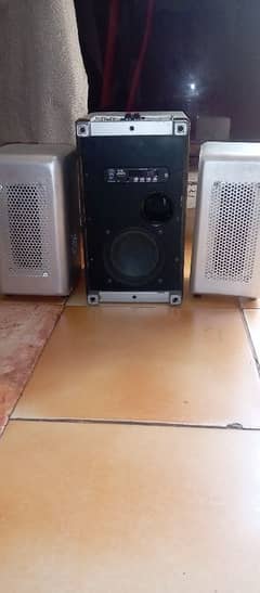 a woofer with blu tooth memory card and USB other system