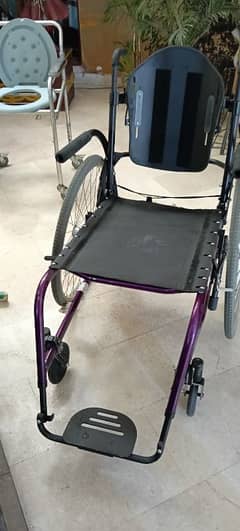 American wheel chair in a very. good condition and a washroom pot