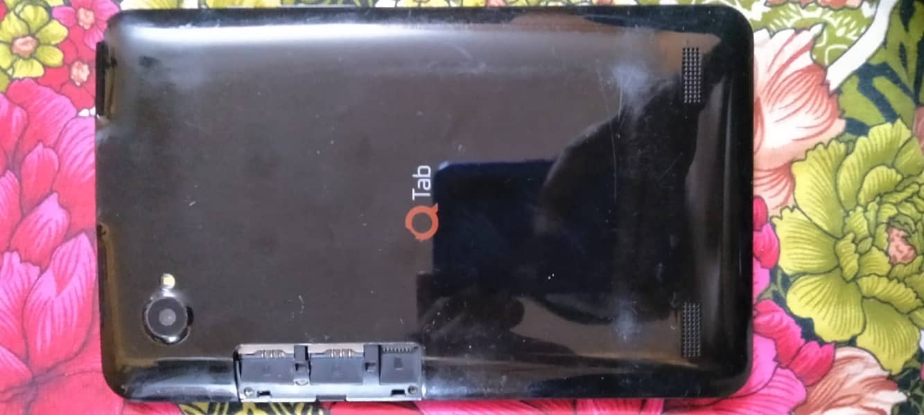 QTab Q100 – SIM Supported Tablet 6