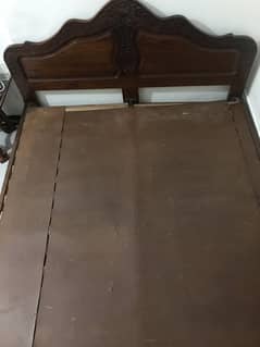 wooden bed with mettress