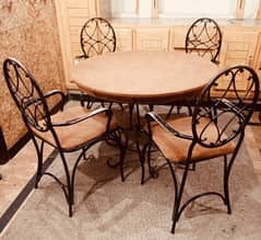 4 person steel base Dining table having good quality.