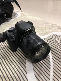 Canon EOS 700D camera with Canon EFS 18-135mm lense