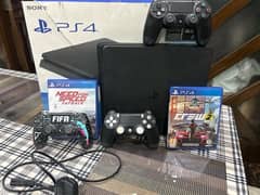 ps4 slim with controllers and games