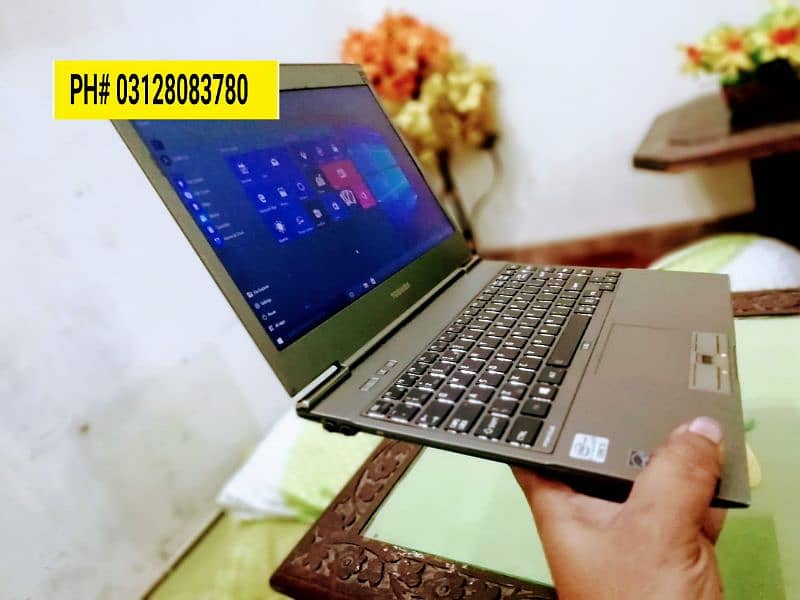 Toshiba paper slim Laptop backlight keyboard corei5 4gb ram 128GB ssd 0