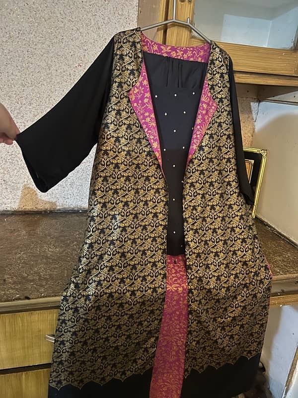 khaadi 3 piece dress. inner, ghrara ana coat. 1