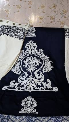 curtains and blinds in dark blue color with good stuff for sale