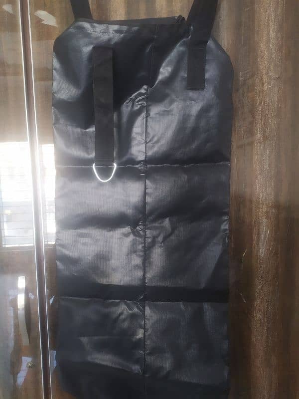 boxing bag with boxing gloves 0