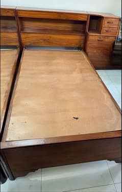 wooden single bed