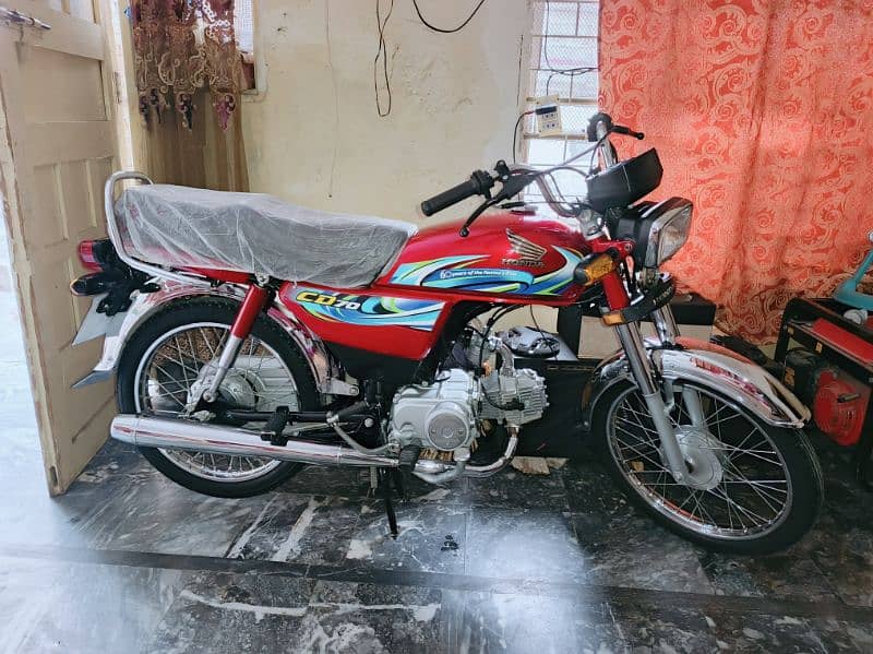 Honda CD 70 2024 4