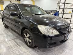 Mitsubishi Lancer 2005 glx. . . my name